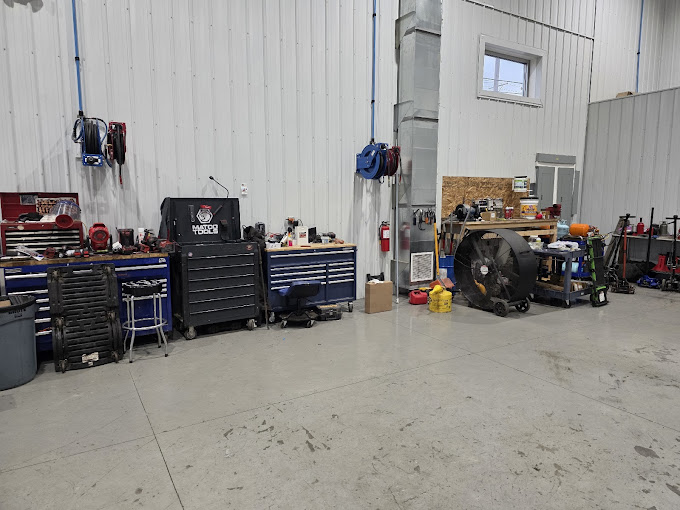 Inside the SH OH Truck Repair workshop showing professional tools, equipment and service area